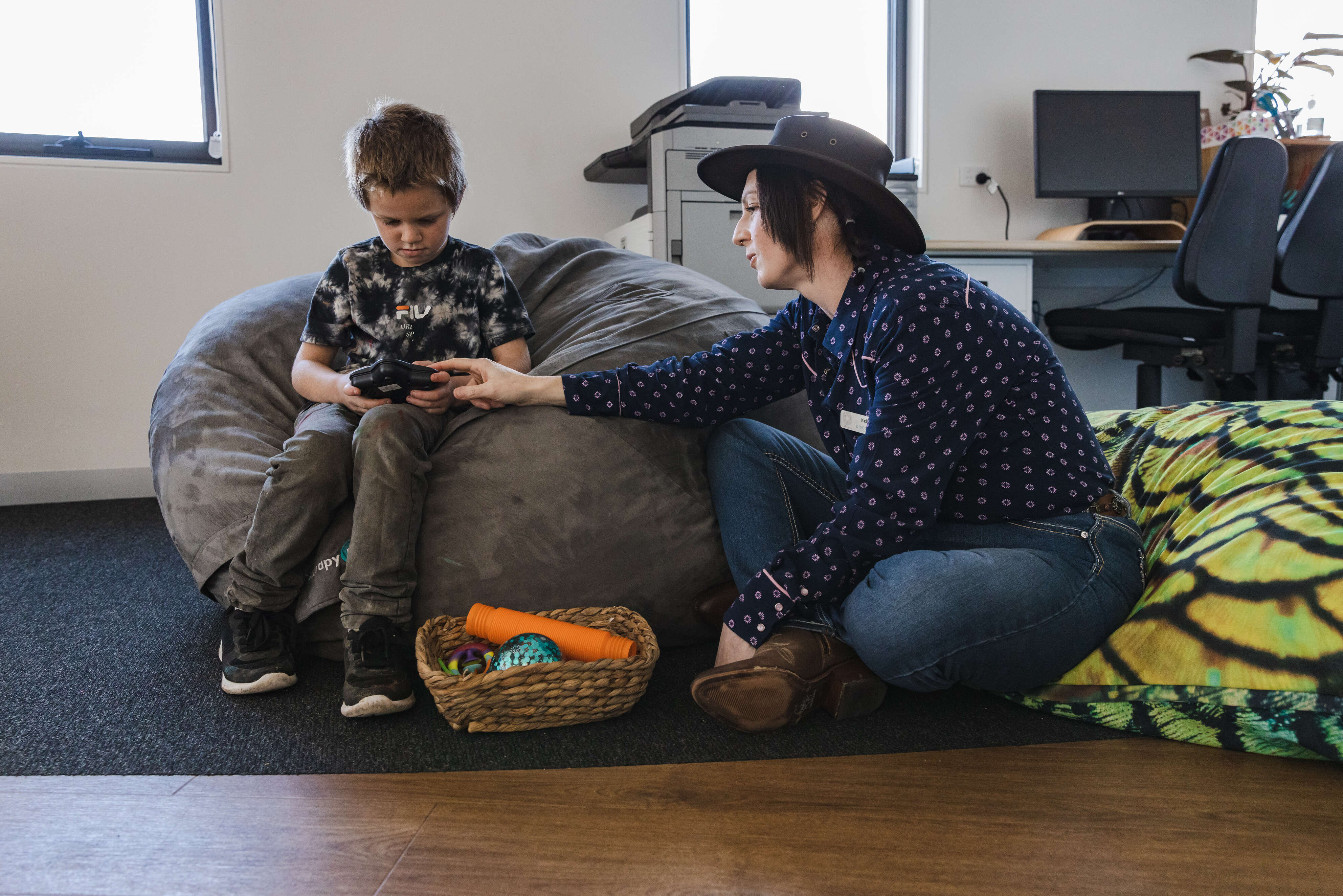 An educator talks to a child