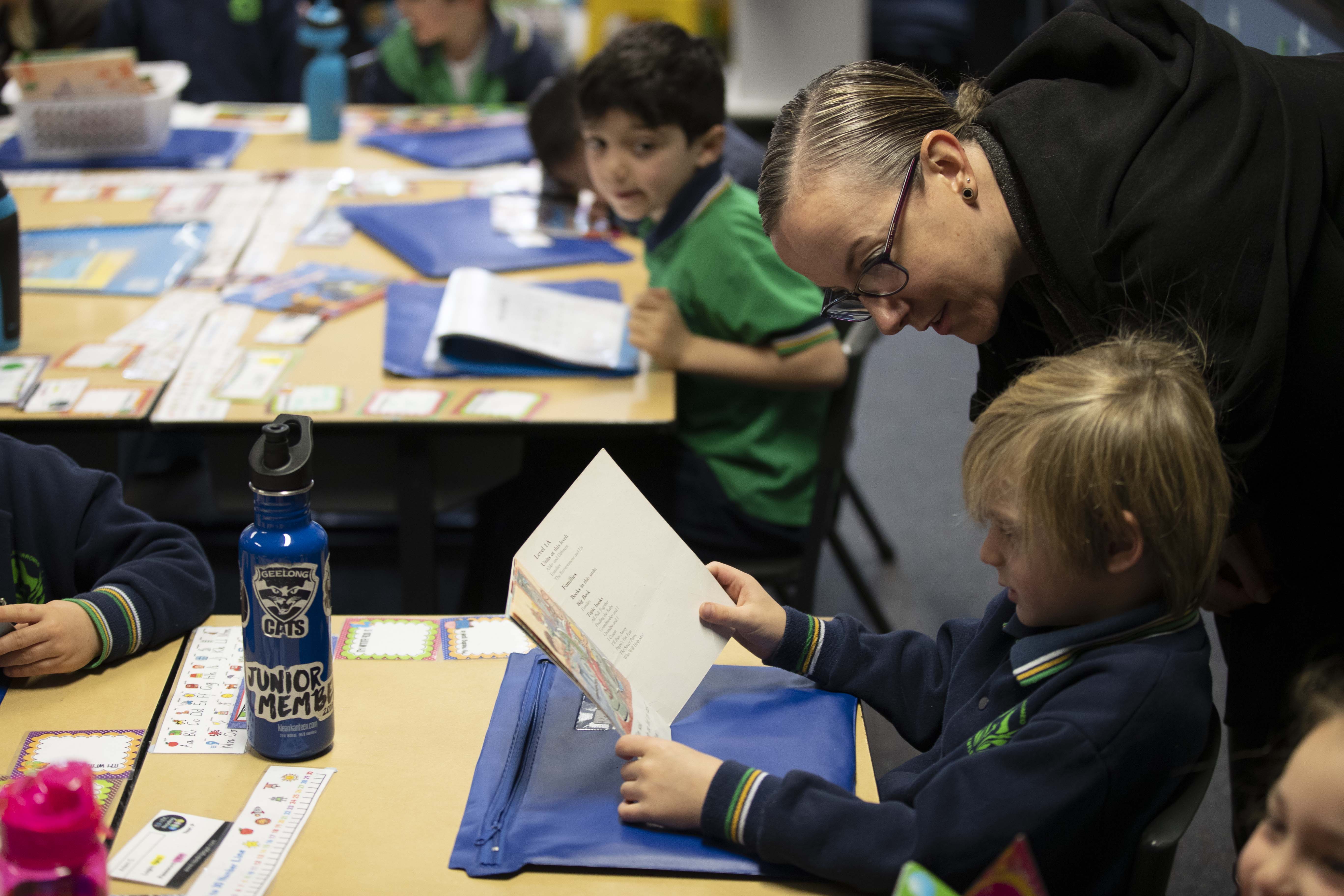 An educator supporting a young child