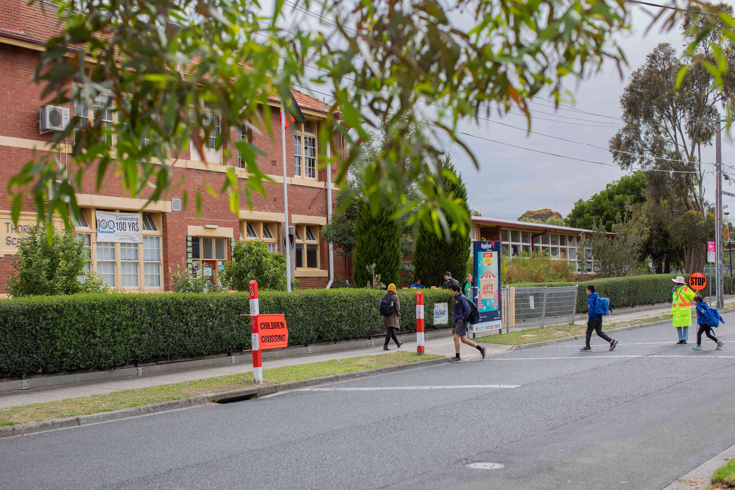 School students crossing the road