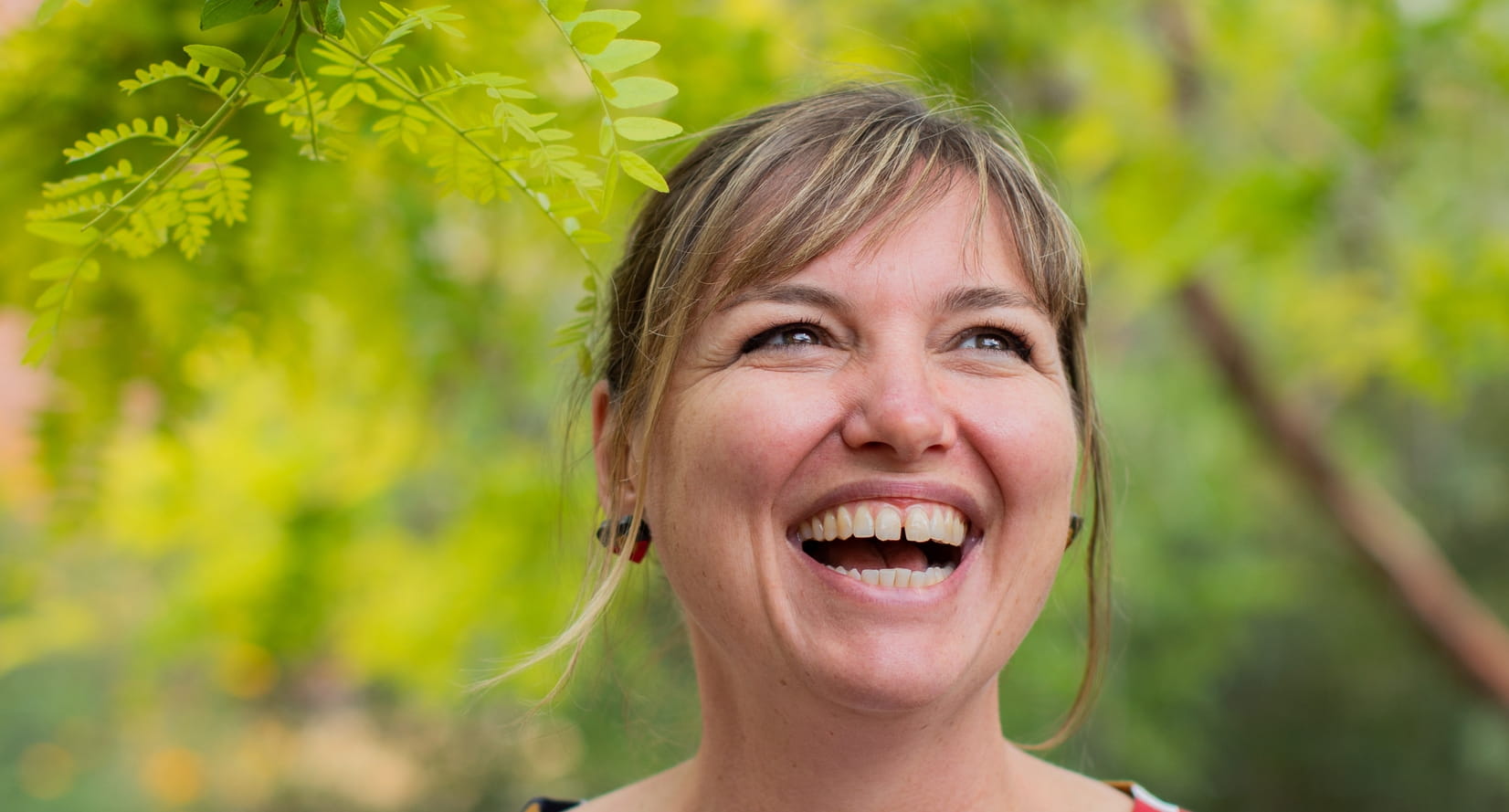 An educator with a big smile