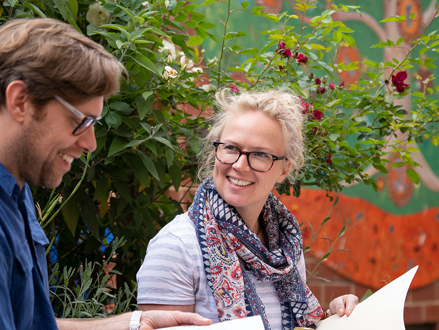 Two educators in conversation