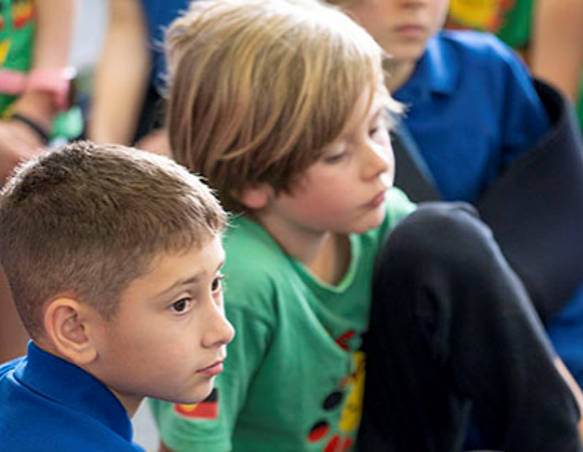 Two young children in a classroom