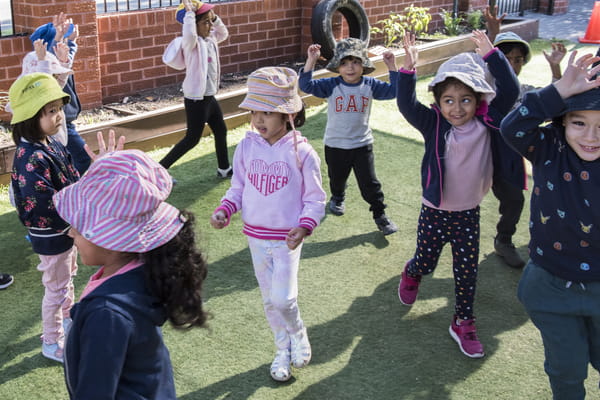 A group of children playing a game outside