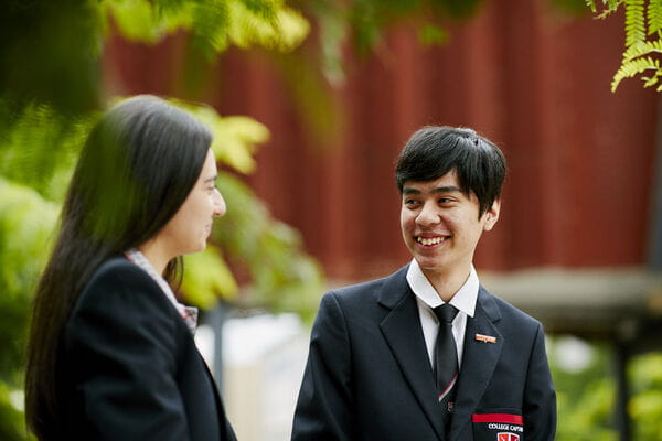 Two adolescents in conversation