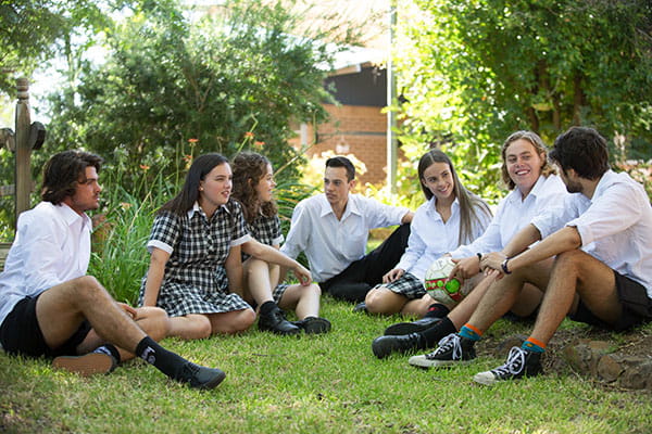 A group of adolescents, engaged in conversation