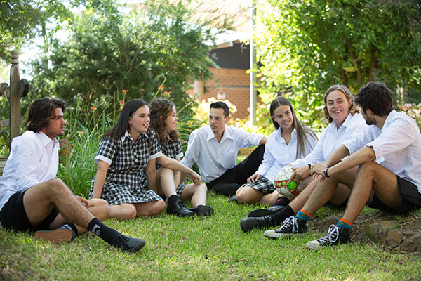 A group of adolescents, engaged in conversation