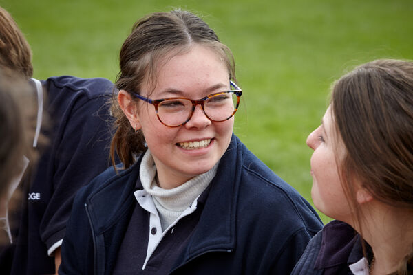Two adolescents in conversation